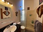 The bathroom with tile shower
